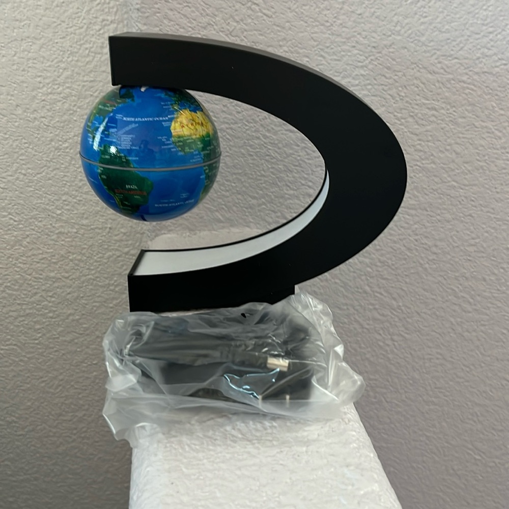 Shape floating globe